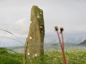 Ogham Stone at Ballinrannig, exposed with seven others during a storm at the end of the 17th century.