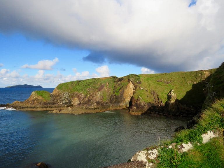 The cliffs of Dunquin with a view of An Fear Marbh on the Wild Atlantic Way walk