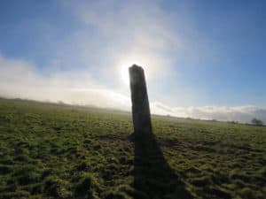 Annascaul standing stone and it's shadow are one as it blocks out the sun.